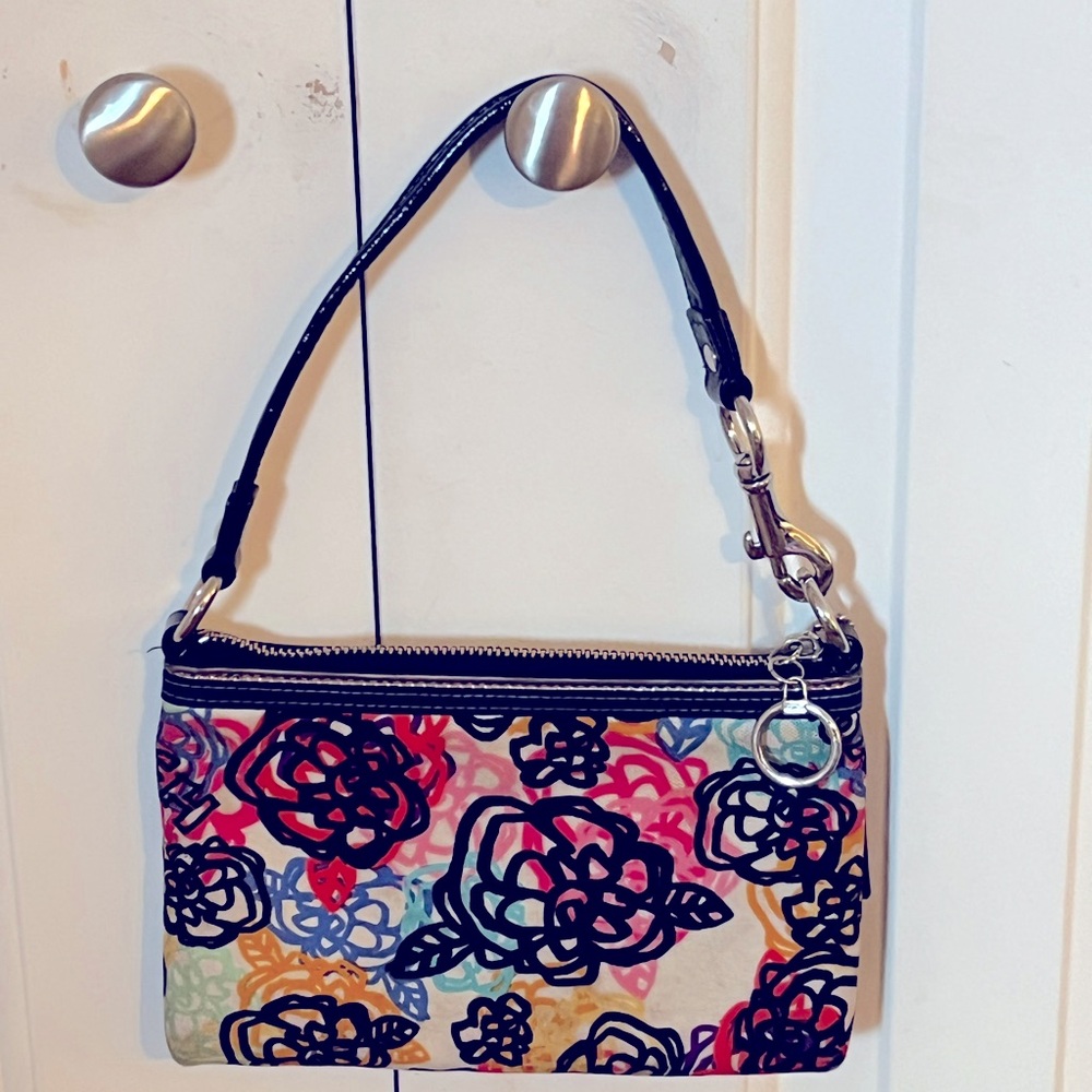 Coach poppy wristlet. Rare poppy collection